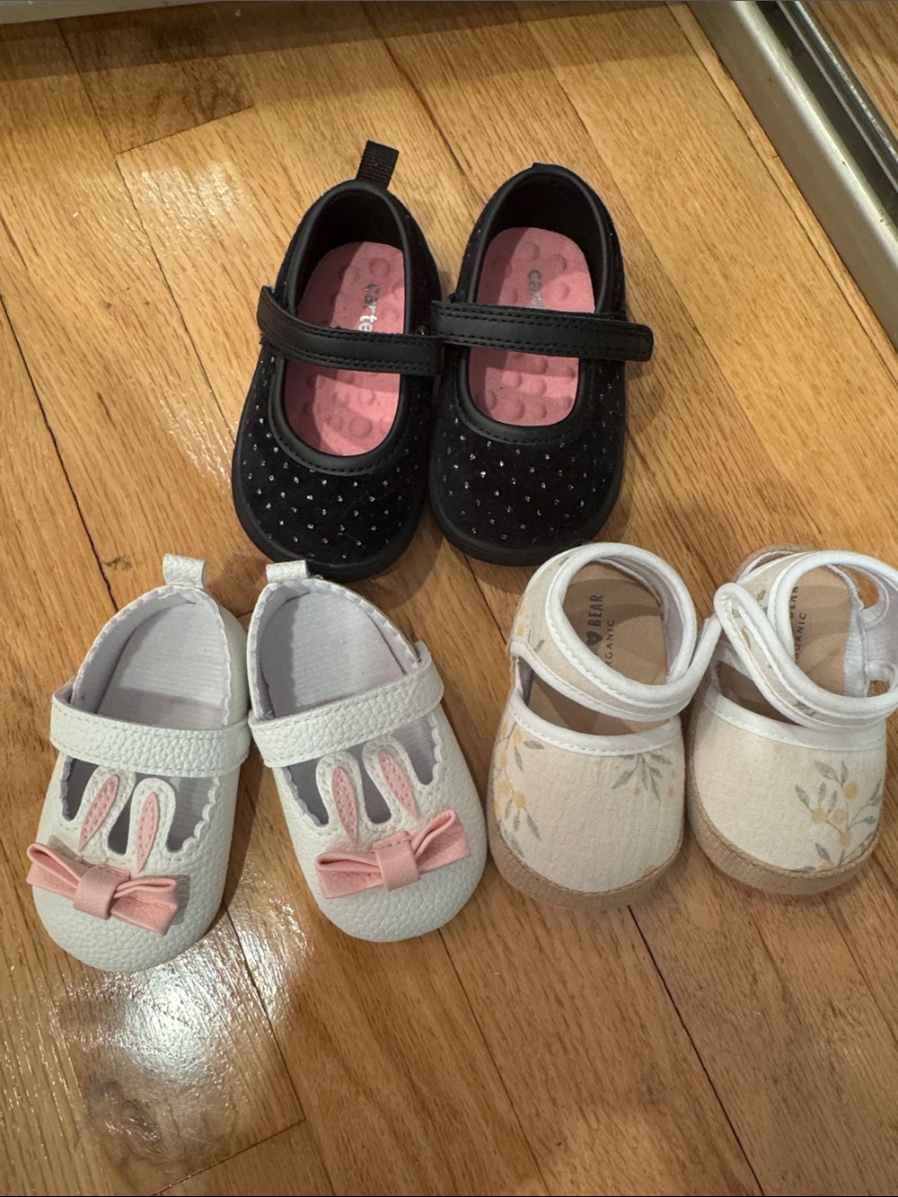 Three pairs of baby girl shoes never worn.